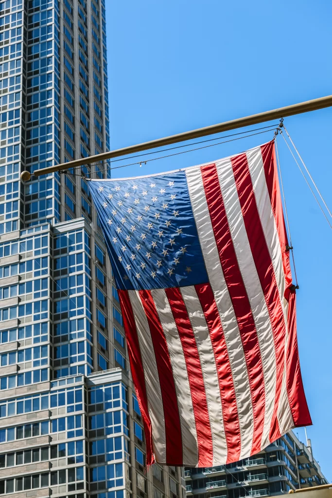 usa flag and skyscrapers 2023 11 27 05 09 37 utc - Universidade Marketplaces